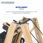 Opgevouwen houten PH Fitness Pilates Reformer met zwarte bekleding en handgrepen